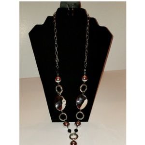 The revel: Long Necklace w/earrings.